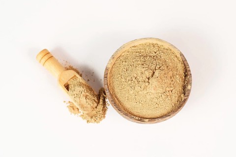 Healing earth powder in a bowl, supplement and antioxidant for to detox the body, alternative