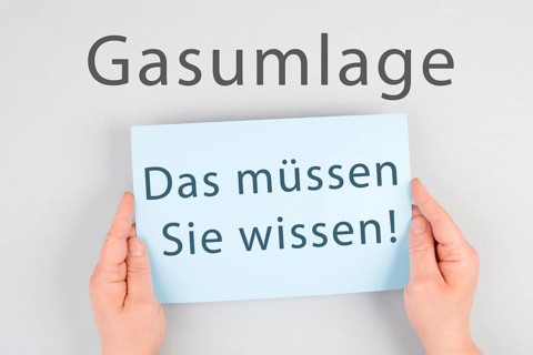 Gas commission is standing in german language on the paper, new fee regualtion in Germany, risk for