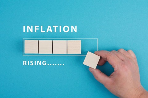 Inflation rising is standing next to the loading bar, high living costs, gas and electricity
