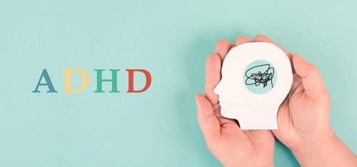 Hands holding a silhouette of a human head, attention deficit hyperactivity disorder, ADHD symptom,