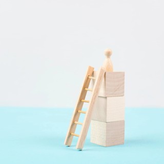 Man was climbing up the ladder, having a goal, brainstorming for ideas, success strategy, taking a