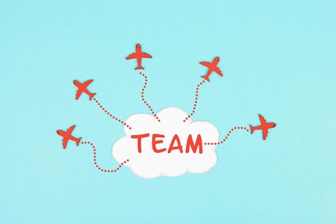 Red airplanes flying out of a cloud, brainstorming for ideas in a team, startup in business, having