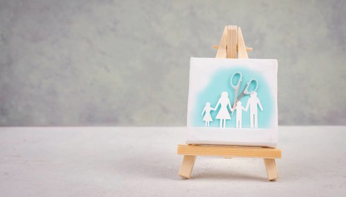 Divored parents, custody battle for the children, scissors cut the family, paper cut out, conflict