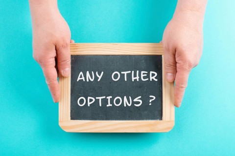 The phrase any other options is standing on a chalkboard, education, business and coaching concept,