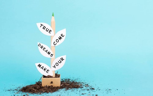 The phrase make your dreams come true is standing on the leaves of the plant, futuristic vision,