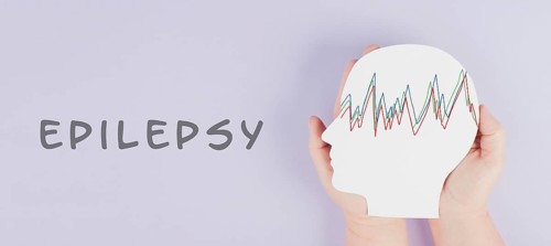 Holding a head in the hands, epilepsy disorder awareness, brain waves, mental health care, paper