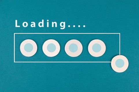 The word loading is standing over the progress bar, hand puts last cube to the row, business,