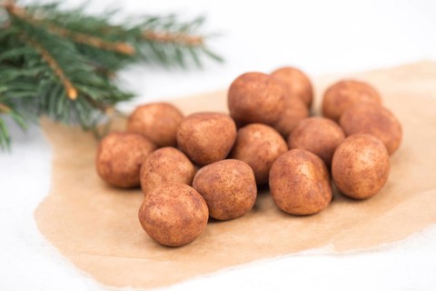 Marzipan potatoes, in german called Marzipankartoffeln, with cacao powder, sweets for christmas,