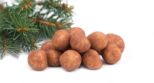 Marzipan potatoes, in german called Marzipankartoffeln, with cacao powder, sweets for christmas,