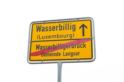 Street sign of the border town Wasserbillig in Luxembourg, frontier to Germany