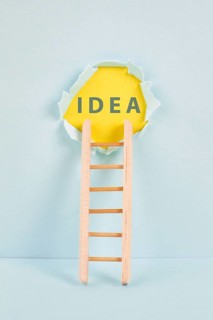 Ladder of success, having an idea, marketing and business concept, brainstorming for new goals,