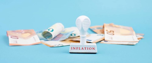 Inflation, financial crash, euro banknotes, economy development and increasing prices