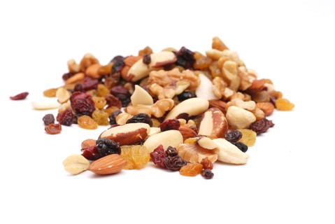Mixture of nuts, dry fruits, healthy food, white background