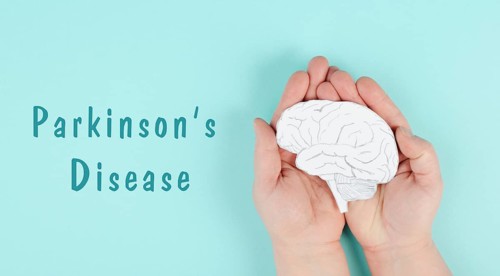 Parkinson's disease is standing on a paper, hands holding brain, dementia diagnosis, Alzheimer's
