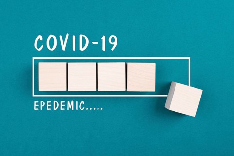 The words Covid-19 epidemic are standig beside the loading bar, end of pandemic, back to normal,