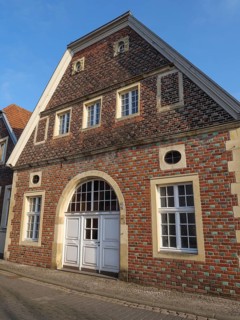 An old house with a stone and brick faÃ§ade and several windows, Coesfeld, Münsterland, North
