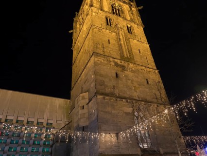 Night shot of a large church with Christmas lighting and fairy lights, Ahaus, Münsterland, North