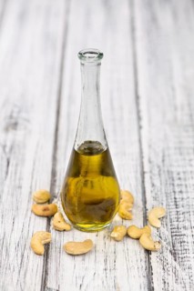 Portion of Cashew Oil (detailed close up shot, selective focus)