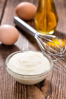 Small portion of fresh homemade Mayonnaise (close-up shot)