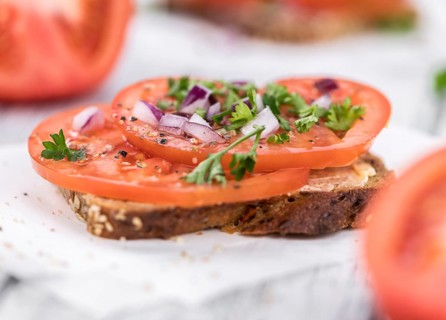 Portion of fresh Tomato Sandwich (selective focus, close-up shot)