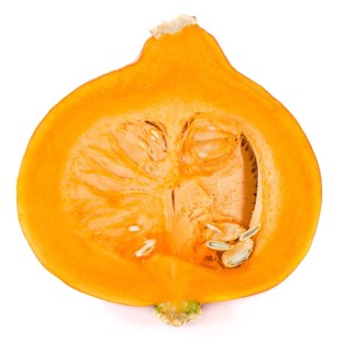 Portion of fresh Pumpkin isolated on white background (close-up shot)