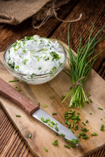 Fresh made Herb Curd (close-up shot) on vintage background