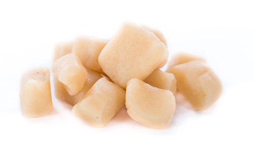 Raw Marzipan (close-up shot) isolated on white background