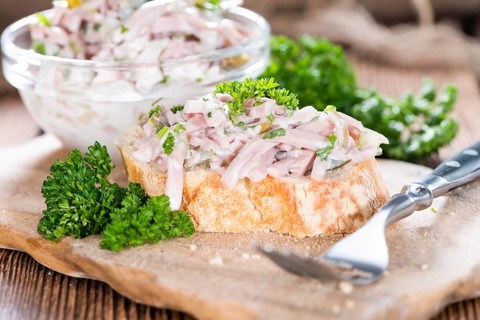 Piece of bread with Meat Salad (detailed close-up shot)