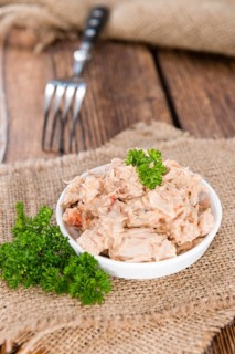 Portion of Tuna salad in a small bowl (close-up shot)