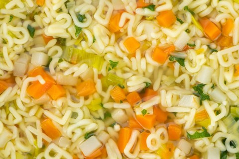 Portion of fresh made Alphabet Soup (selective focus, close-up shot)