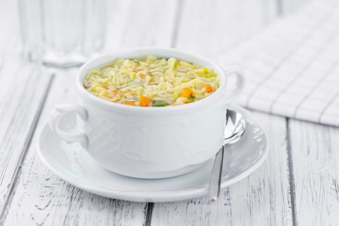 Portion of fresh made Alphabet Soup (selective focus, close-up shot)