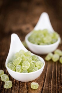 Apple flavoured gummy candy (close-up shot, selective focus)