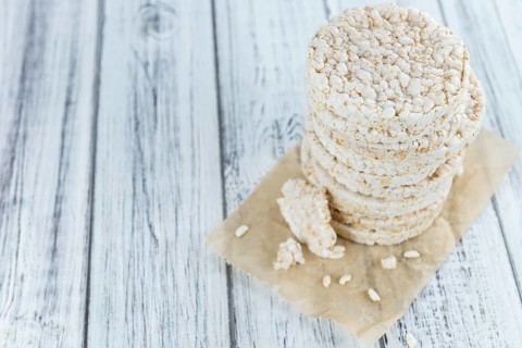 Portion of Rice Cakes (close-up shot) on wooden background