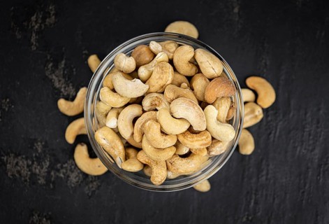 Portion of Cashew Nuts (close up shot, selective focus)