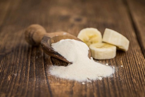 Portion of fresh Banana Powder close-up shot, selective focus