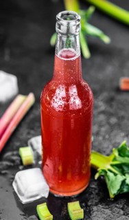 Homemade Rhubarb Spritzer as detailed close up shot (selective focus)