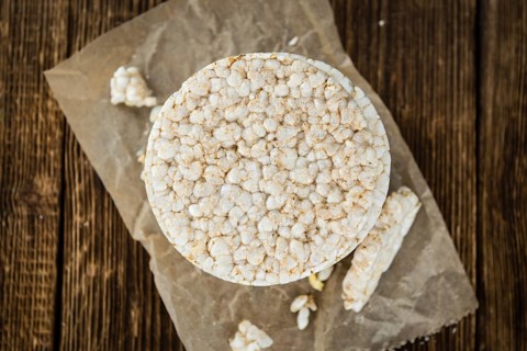Some Rice Cakes on an old wooden background (detailed close-up shot)