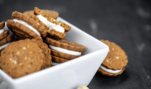 Hazelnut Cream Cookies as detailed close up shot (selective focus)