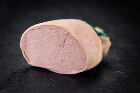 Portion of fresh made Liverwurst (close-up shot, selective focus)
