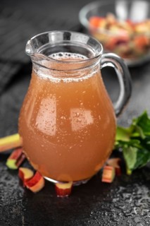 Portion of fresh made Rhubarb Juice (close up shot, selective focus)