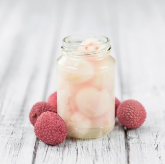 Preserved Lychees on a vintage background as detailed close-up shot (selective focus)
