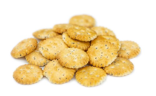 Portion of mixed Snacks isolated on white background (close up shot, selective focus)