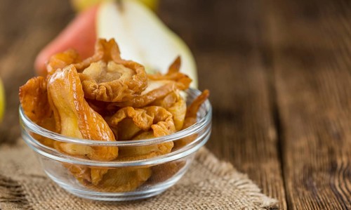 Dried Pears (selective focus) on an old wooden table