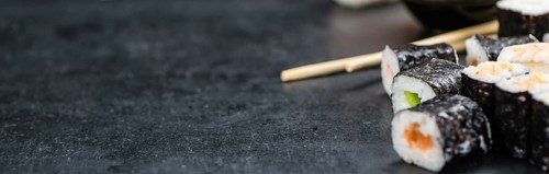 Fresh made Sushi (selective focus) on a vintage looking slate slab