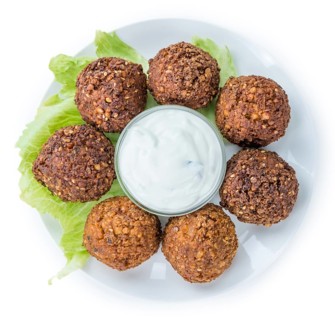 Falafel (close-up shot, selective focus) isolated on white background