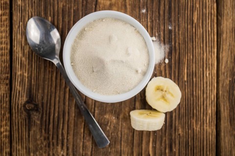 Banana Powder on a vintage background as detailed close-up shot, selective focus