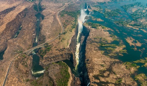 Victoria Falls at drought near Livingstone, Zimbabwe, as aerial shot made from a helicopter, Africa