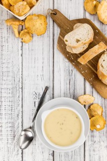 Portion of fresh Chanterelle Soup close-up shot, selective focus