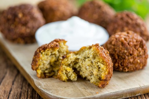 Falafel (close-up shot, selective focus) on an old wooden table