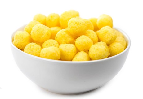 Cheese Balls isolated on white background (selective focus, close-up shot)